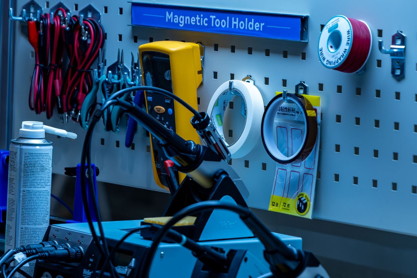 Organized repair workbench with tools at the Haviram workshop